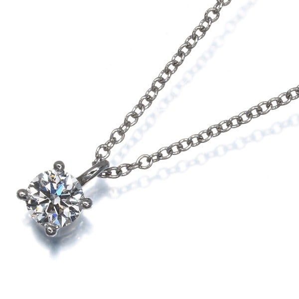 Tiffany&Co. Necklace Diamond 0.29Ct Solitaire 950 Platinum: Tiffany&Co. Necklace Diamond 0.29Ct Solitaire 950 Platinum Tiffany & Co.'s 0.29ct diamond solitaire pendant is a timeless piece of elegance, featuring a natural diamond set in 950 platinum. The pendan
