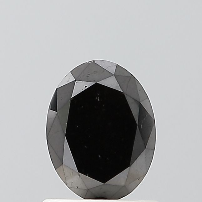 Oval 0.85ct Black VVS2 - Loose Natural Diamond: Oval 0.85ct Black VVS2 - Loose Natural Diamond Oval cut, 0.85ct black diamond with exceptional clarity (VVS2) and polish (EX), showcasing its natural beauty. Measuring 6.89L x 5.26W x 3.39H, this loos