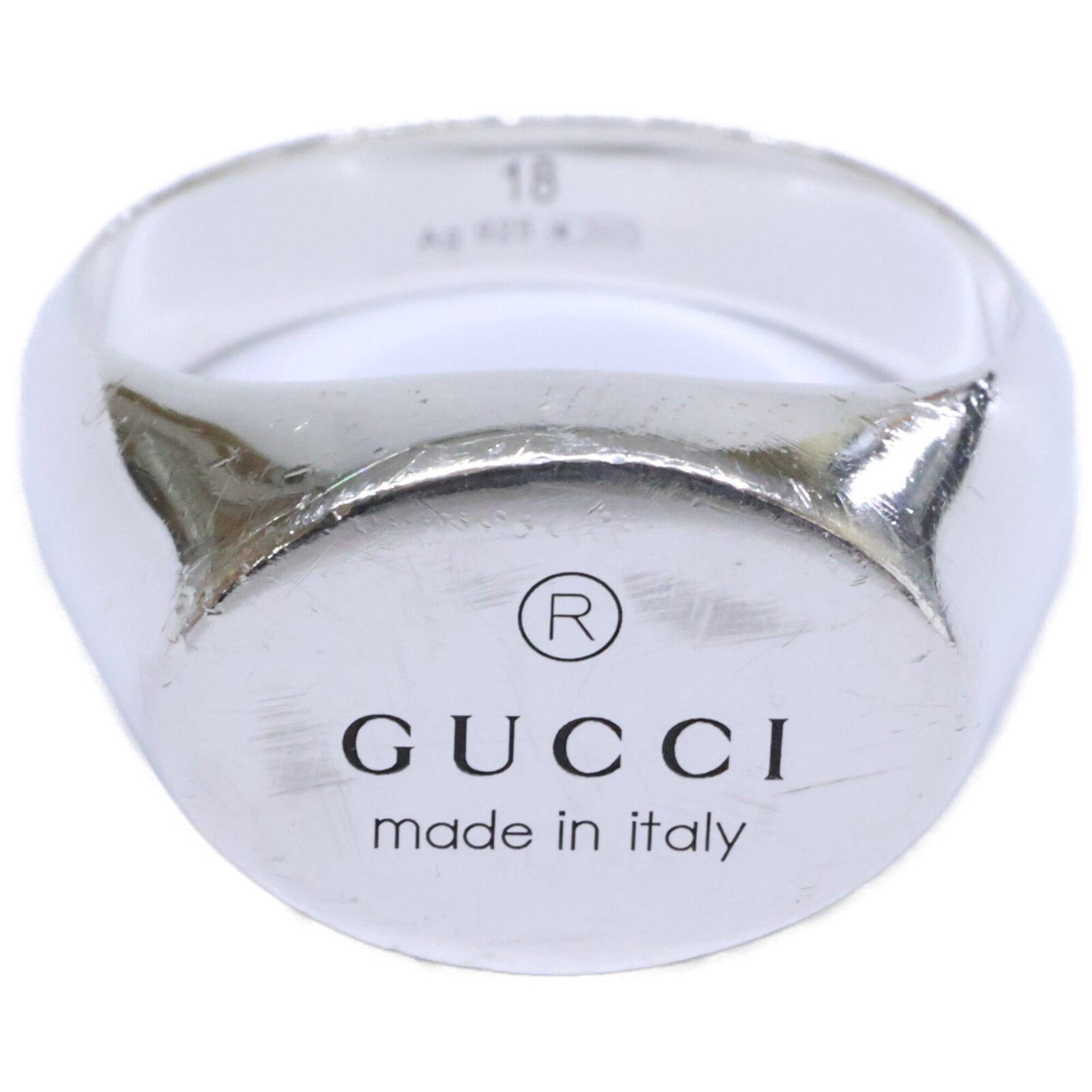 GUCCI Band Ring Silver 925: GUCCI Band Ring Silver 925 Silver 925 band ring from Gucci, featuring a sleek and modern design. The ring bears visible signs of wear, including scratches and scuffs, and is made from high-quality sil