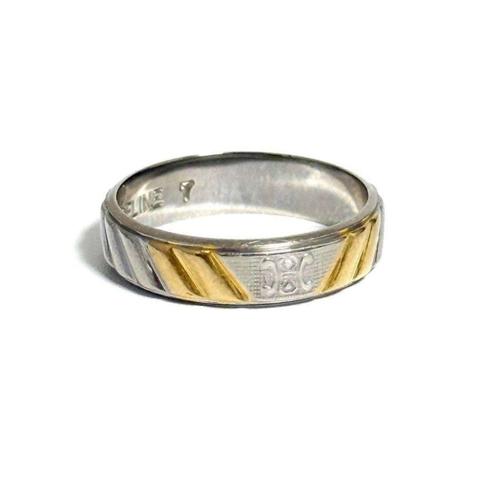 CELINE Band Ring Platinum 950 Yellow Gold (18K): CELINE Band Ring Platinum 950 Yellow Gold (18K) Platinum 950 Yellow Gold (18K) band ring from Celine, available in US size 4. This gently used ring features a subtle yellow gold tone and minor signs o