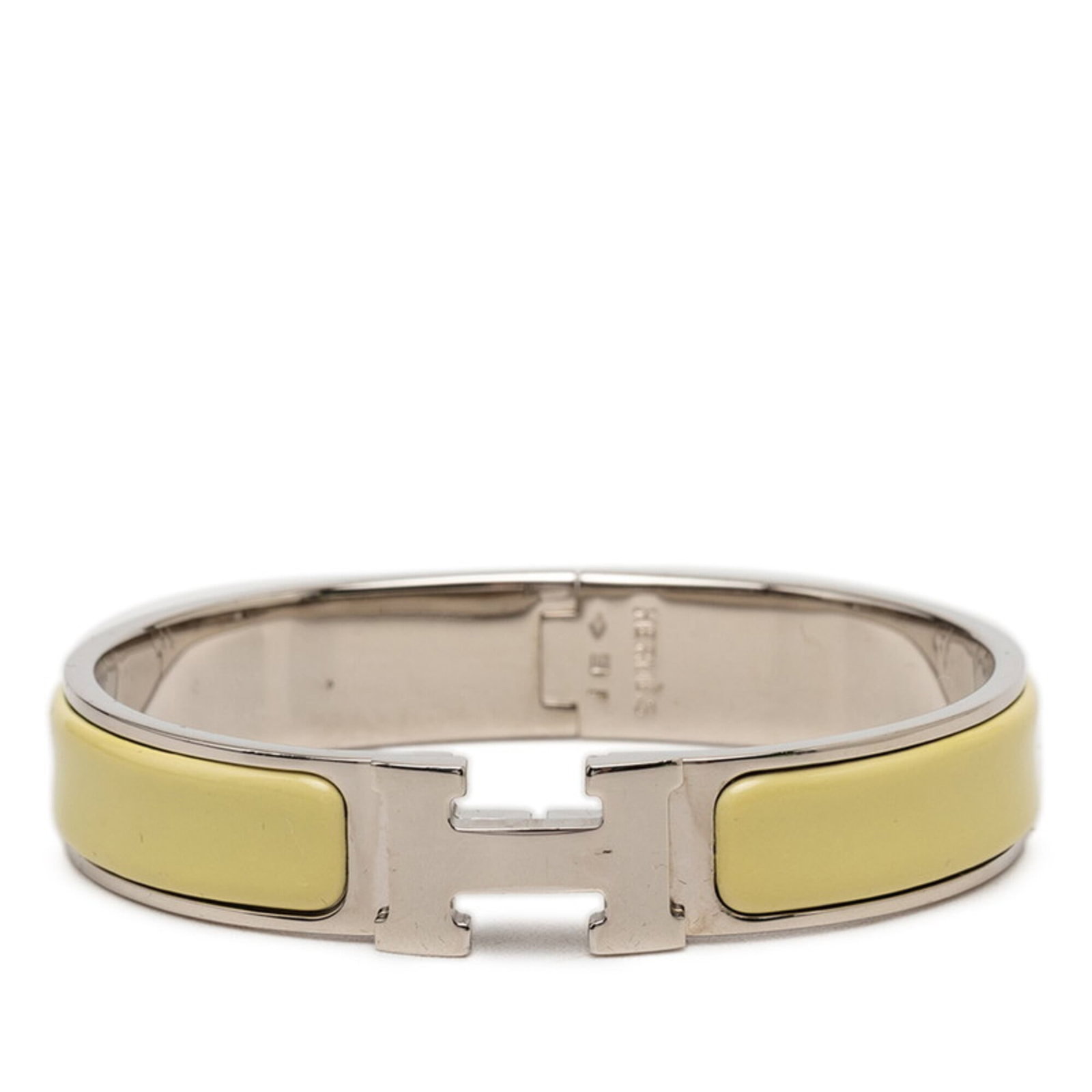 HERMES Charm Bracelet Enamel Metal: HERMES Charm Bracelet Enamel Metal Silver and yellow enamel metal charm bracelet from the iconic Hermes Line, featuring a classic design with visible wear and scratches. This 15.5cm / 6.1'' long