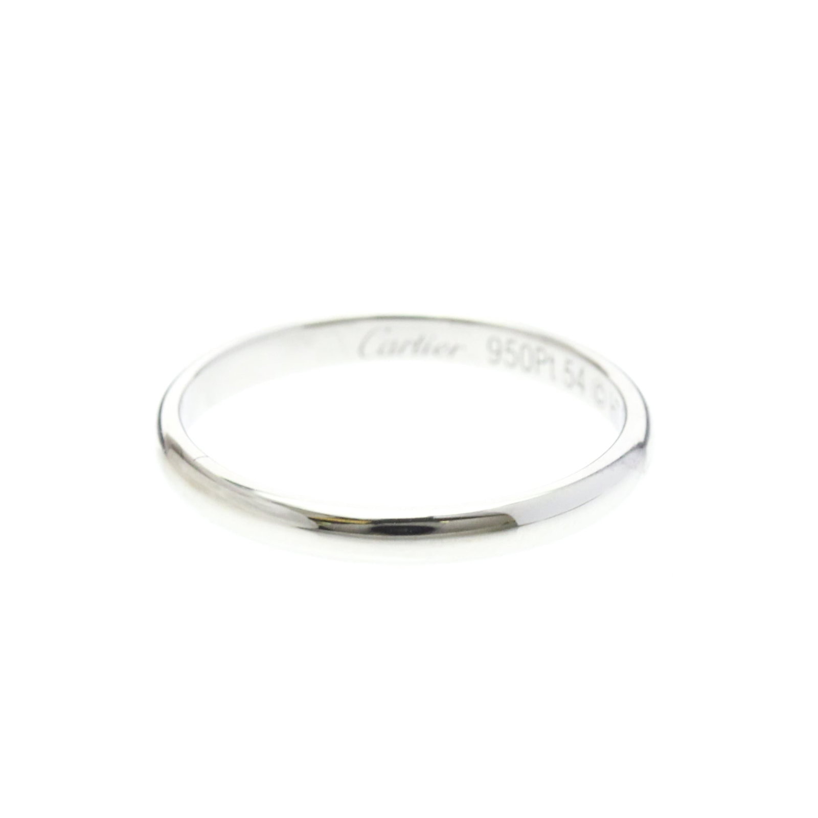 CARTIER Band Ring Platinum: CARTIER Band Ring Platinum Platinum band ring from Cartier, featuring a sleek 54 US size with a width of 2.5mm, crafted from 950 platinum metal. This gently used ring shows minor signs of wear and sma
