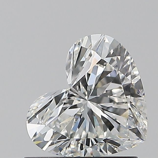 GIA Heart 0.9ct G VVS2 - Loose Natural Diamond: GIA Heart 0.9ct G VVS2 - Loose Natural Diamond GIA-certified, this 0.9ct G VVS2 diamond boasts exceptional clarity and color, with a high polish and near-perfect symmetry. Measuring 5.92L x 6.8W x