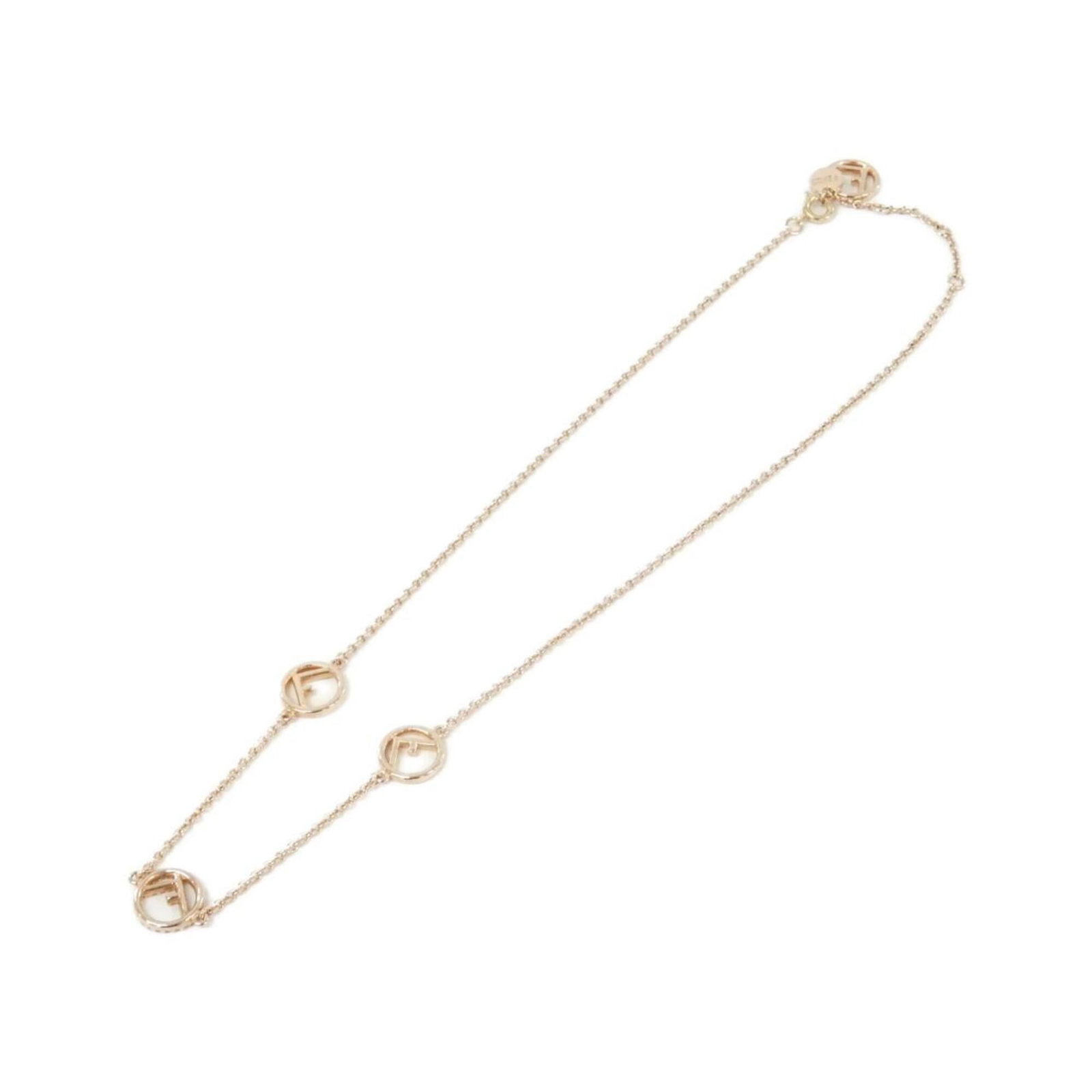 FENDI Clear Pink Gold: FENDI Clear Pink Gold The Fendi Clear Pink Gold necklace boasts a striking clear pink gold hue, adding a touch of elegance to any outfit. Measuring 10mm x 10mm, the 10mm pendant is perfectly