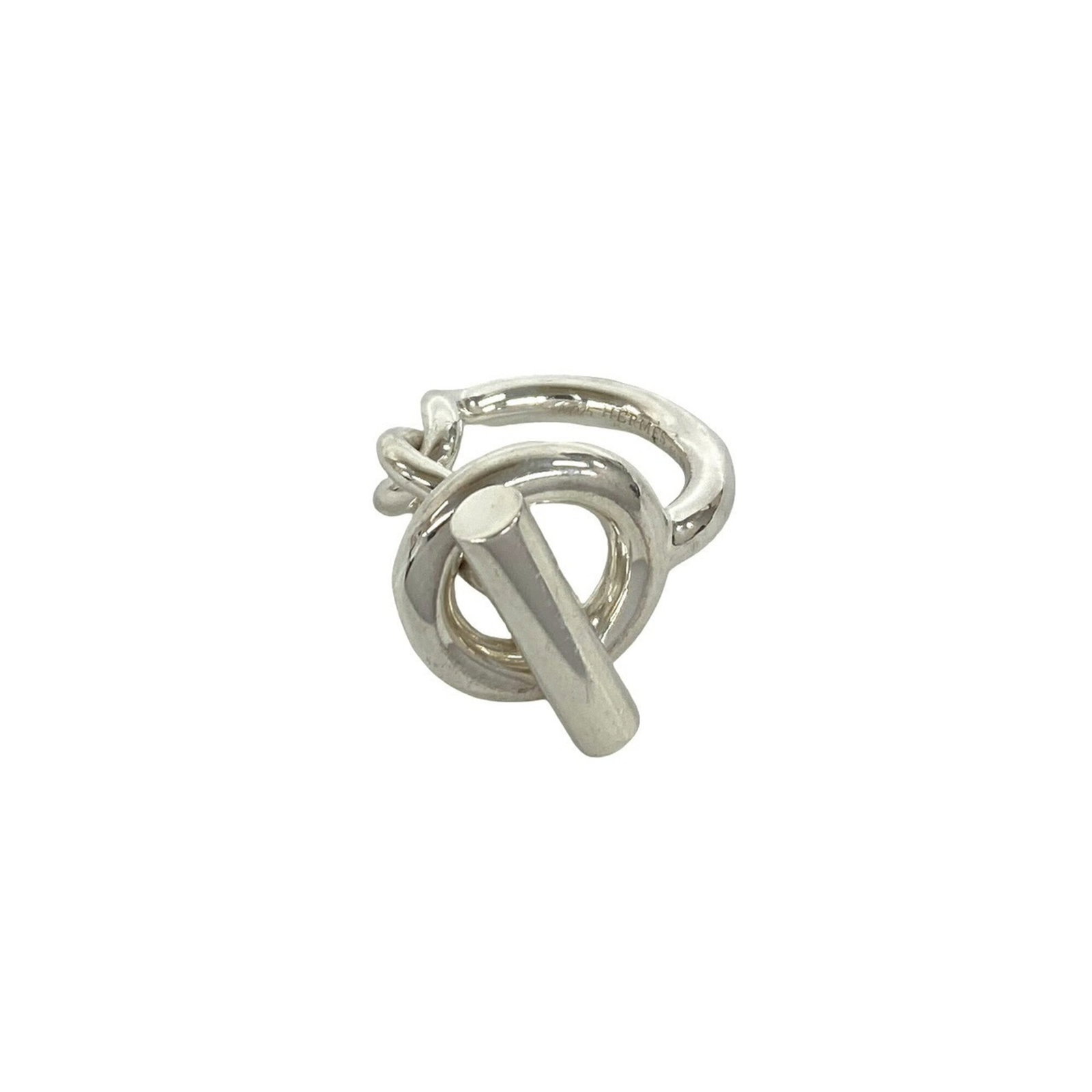 HERMES Band Ring Silver 925: HERMES Band Ring Silver 925 Silver 925 band ring from Hermes features a sleek design. The item bears visible wear, including scratches and scuffs, and is in good overall condition. Item Specifics: