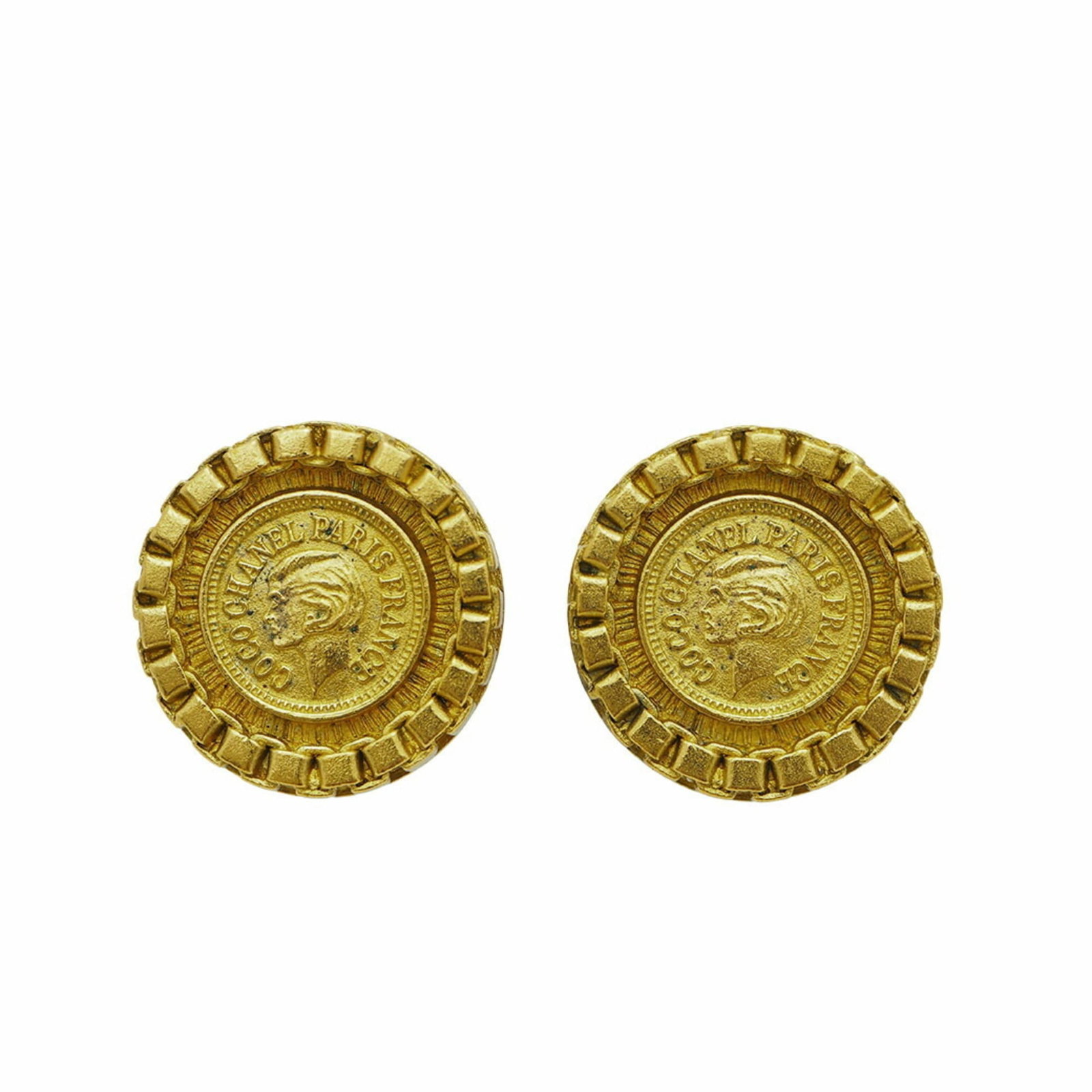 CHANEL Gold: CHANEL Gold Gold accents and sleek design make this CHANEL piece a timeless addition to any collection. With visible scratches and scuffs, this item has a worn-in look that adds to its character.