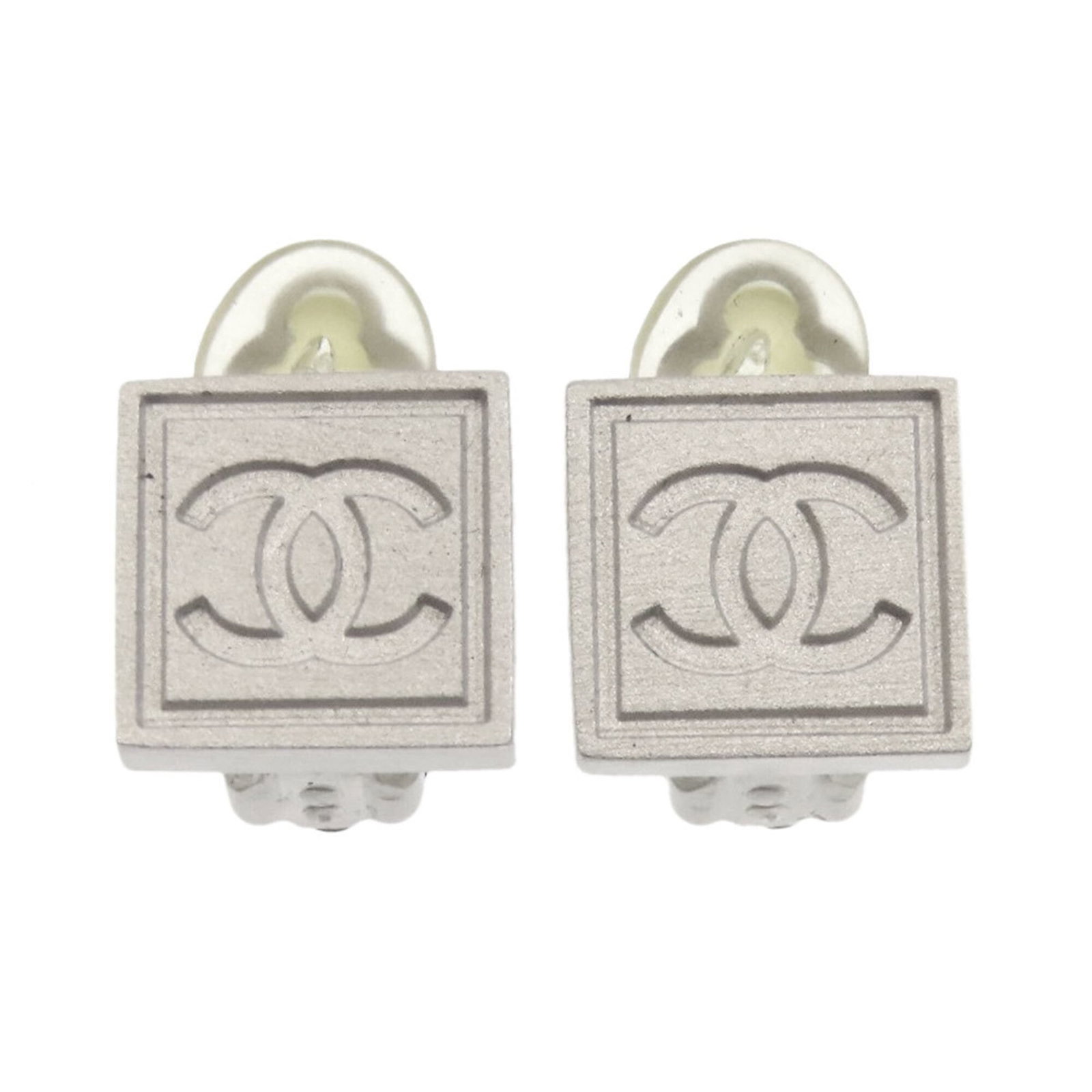 CHANEL Clip Earrings Metal: CHANEL Clip Earrings Metal Silver Clip Earrings from Chanel, featuring a metal design with minor scratches and light marks, gently used in very good condition. Item Specifics: Brand: Chanel Type: