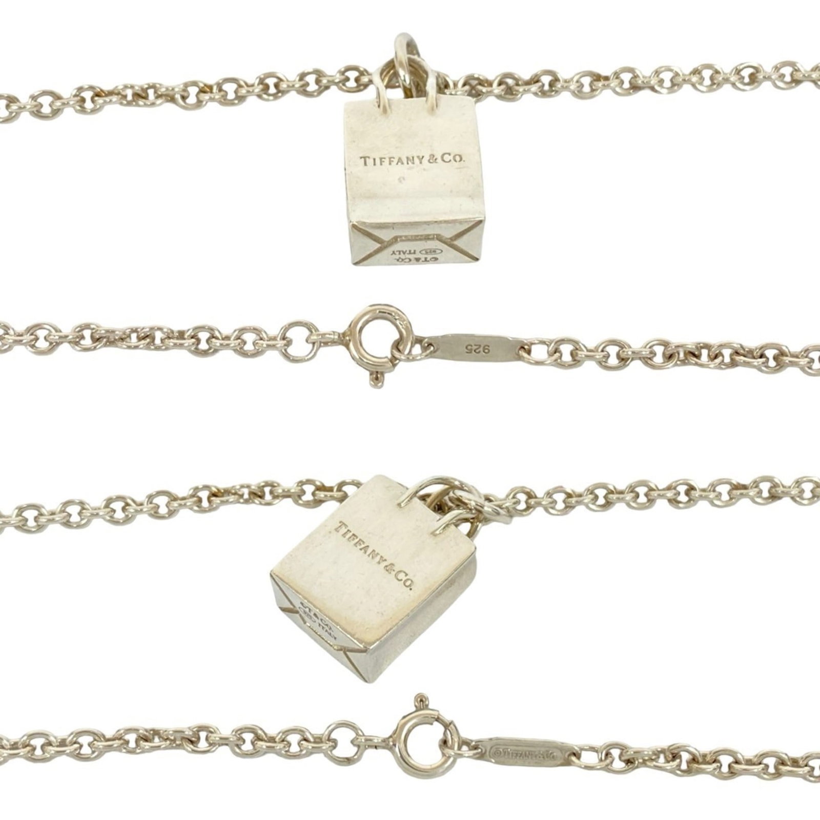 TIFFANY Silver 925: TIFFANY Silver 925 Silver Tiffany necklace with a pendant featuring a 13mm x 11mm design, made from 925 sterling silver and presented in a silver box with a dust bag. The necklace has a 40 cm circumfe