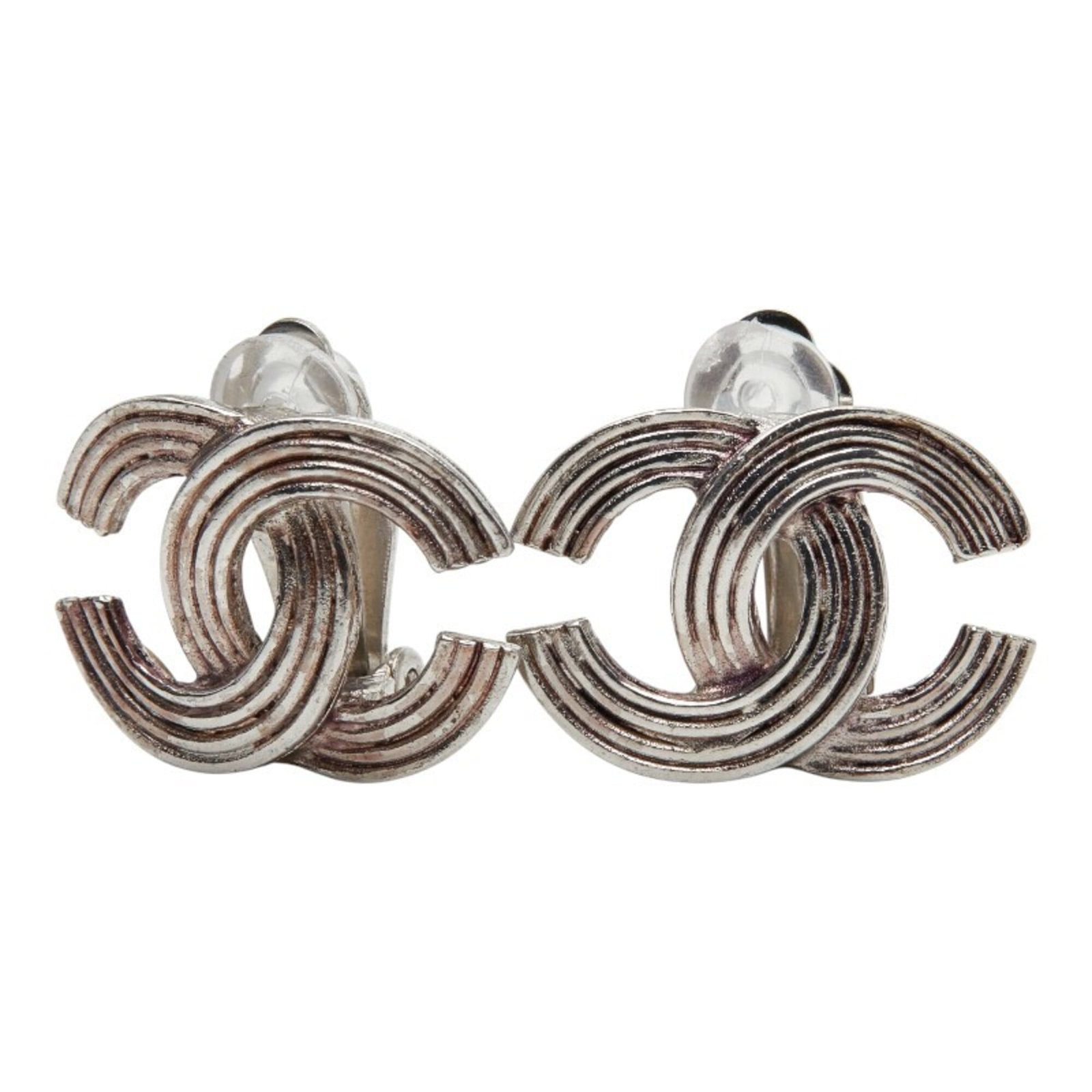 CHANEL Clip Earrings Metal: CHANEL Clip Earrings Metal Silver Clip Earrings from CHANEL, featuring a metal design with visible scratches and scuffs, bearing a signature. The earrings are in good used condition, measuring