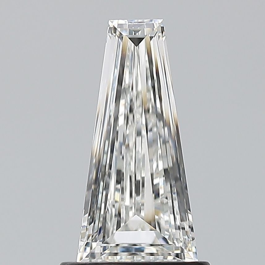 GIA Tapered Baguette 0.79ct G VVS2 - Loose Natural Diamond: GIA Tapered Baguette 0.79ct G VVS2 - Loose Natural Diamond GIA certified, this 0.79ct G VVS2 diamond boasts exceptional clarity and color, making it a standout among loose diamonds. Its EX polish and