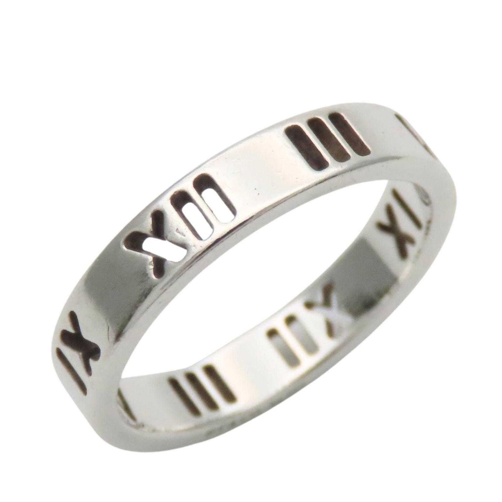 TIFFANY Band Ring Silver 925: TIFFANY Band Ring Silver 925 Silver 925 band ring from Tiffany's Atlas line, featuring a sleek and modern design. This gently used ring showcases a silver finish with a width of 3.6mm and a US size of