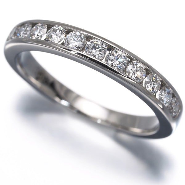 Tiffany&Co. Ring Diamond Channel Set Wedding Band Half Us5 950 Platinum: Tiffany&Co. Ring Diamond Channel Set Wedding Band Half Us5 950 Platinum Tiffany & Co.'s platinum wedding band features a natural diamond channel set, showcasing a 3.7g ring with a US5 size and 3.0mm d