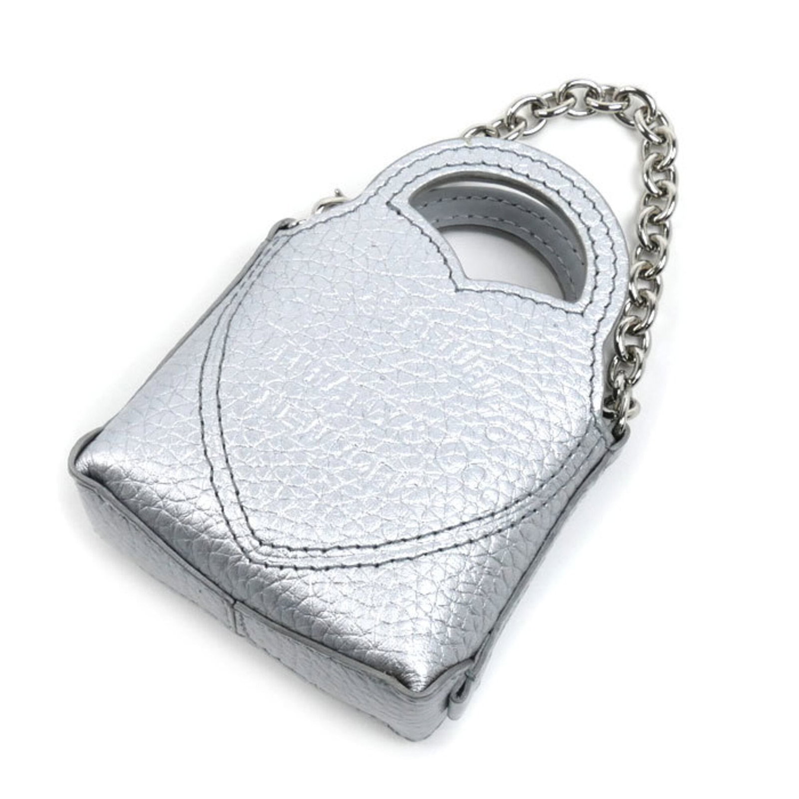 TIFFANY Handbag Charm Leather: TIFFANY Handbag Charm Leather Silver Tiffany Country of Origin: USA Handbag charm made from genuine leather, bearing a signature. Gently used with minor signs of wear, this charm is in very good condi