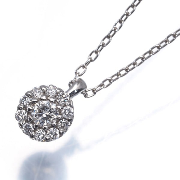 Diamond 0.15Ct Flower Necklace 950 850 Platinum: Diamond 0.15Ct Flower Necklace 950 850 Platinum 950 platinum metal purity and 0.15ct diamond make this flower-shaped pendant a striking piece. The natural diamond is set in a 950/850 platinum base met