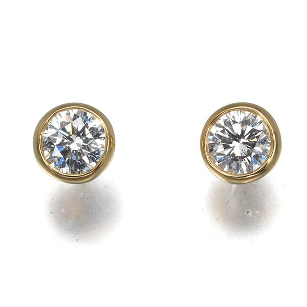 Tiffany&Co. Earrings Diamond By The Yard 18K Yg: Tiffany&Co. Earrings Diamond By The Yard 18K Yg Tiffany & Co.'s 18k yellow gold By The Yard earrings showcase a natural diamond, with a diameter of approximately 3.6mm, suspended from a stud design. T