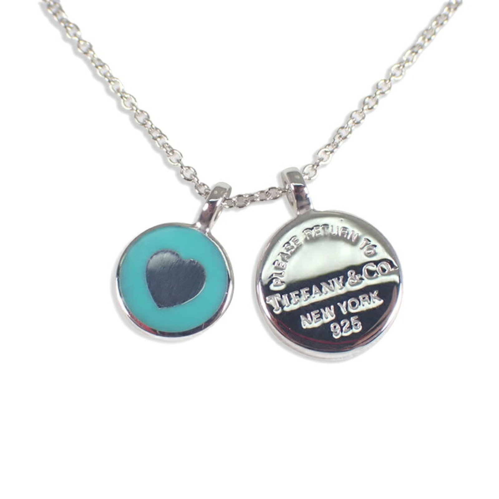 TIFFANY Sterling Silver 925: TIFFANY Sterling Silver 925 Sterling silver 925 necklace from Tiffany, featuring a 13.5mm x 9.9mm pendant, measures 47 cm in circumference. Gently used with minor signs of wear, including small scratc