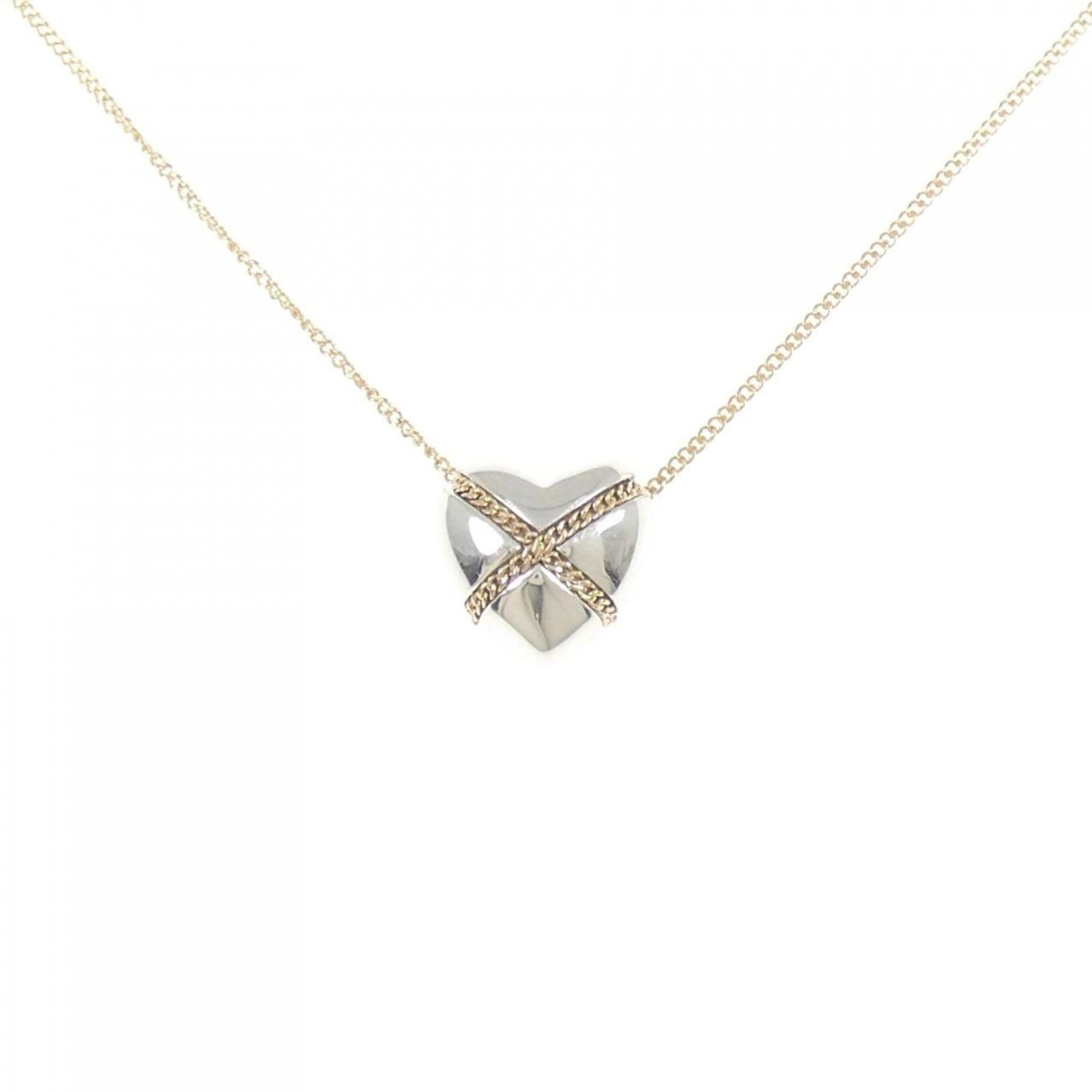 TIFFANY Silver 925 Yellow Gold (18K): TIFFANY Silver 925 Yellow Gold (18K) Silver 925 Yellow Gold (18K) Tiffany Necklace Pendant: A delicate 18K yellow gold pendant, set in sterling silver 925, measuring 11.8mm x 12.3mm, is available for 