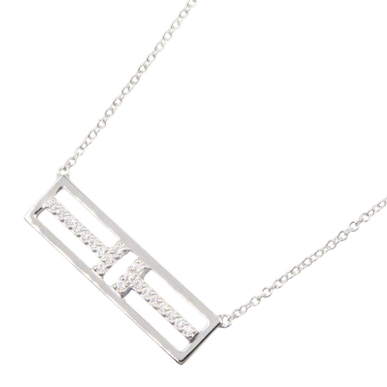 TIFFANY White Gold (18K): TIFFANY White Gold (18K) Tiffany White Gold (18K) Necklace is a beautiful piece featuring a clear, silver stone diamond set in 18K white gold. The necklace boasts a 40 cm - 45.5 cm circumference and a