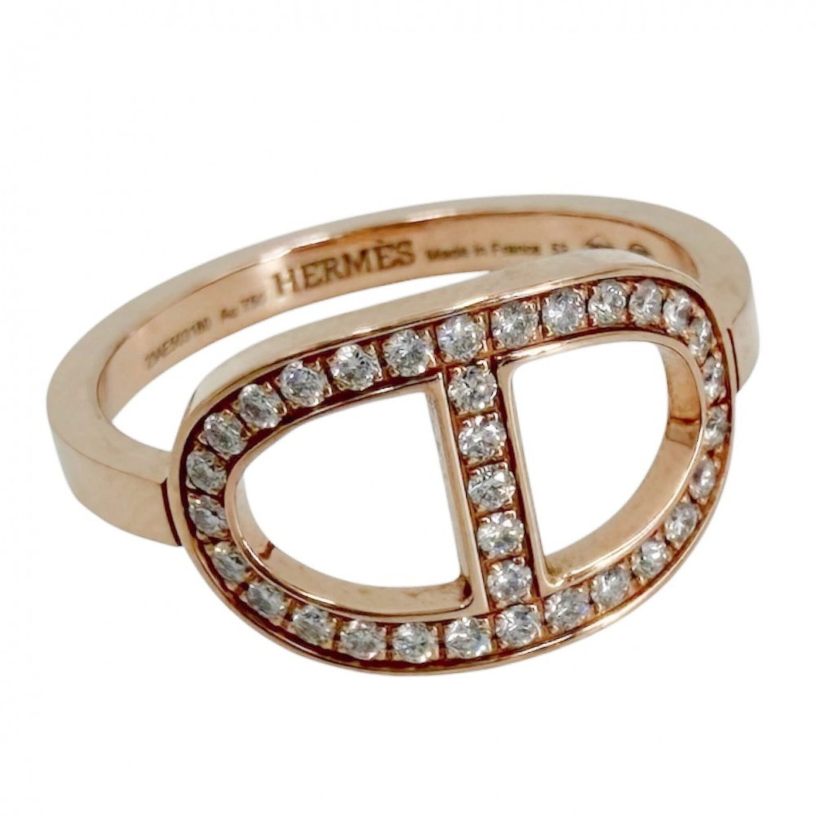 HERMES Band Ring Pink Gold (18K): HERMES Band Ring Pink Gold (18K) Pink gold (18K) band ring from Hermes, featuring a subtle pink hue. The ring shows signs of wear, including scratches and scuffs, but remains fully functional. Item Sp