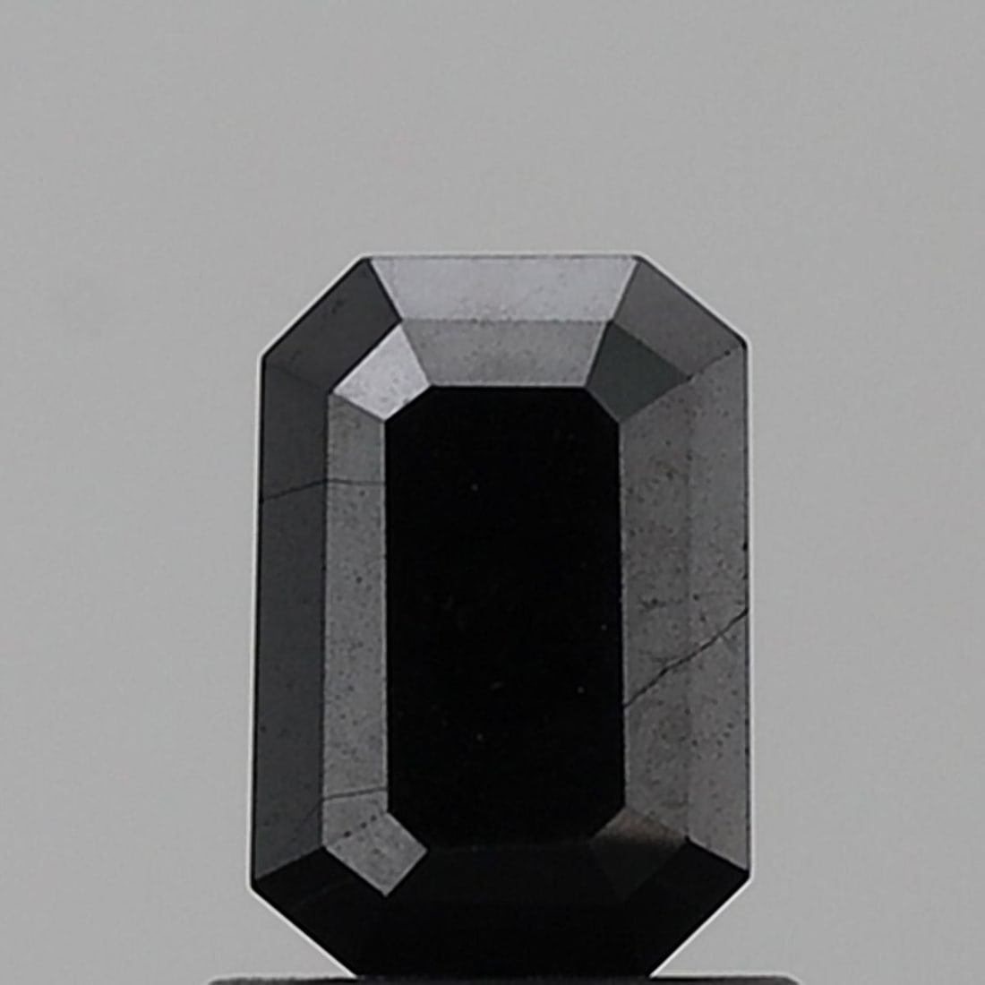 Emerald 1.17ct Black VVS2 - Loose Natural Diamond: Emerald 1.17ct Black VVS2 - Loose Natural Diamond This 1.17ct loose natural black diamond boasts exceptional clarity and polish, with a VVS2 clarity grade and EX symmetry. Its EX polish ensures a