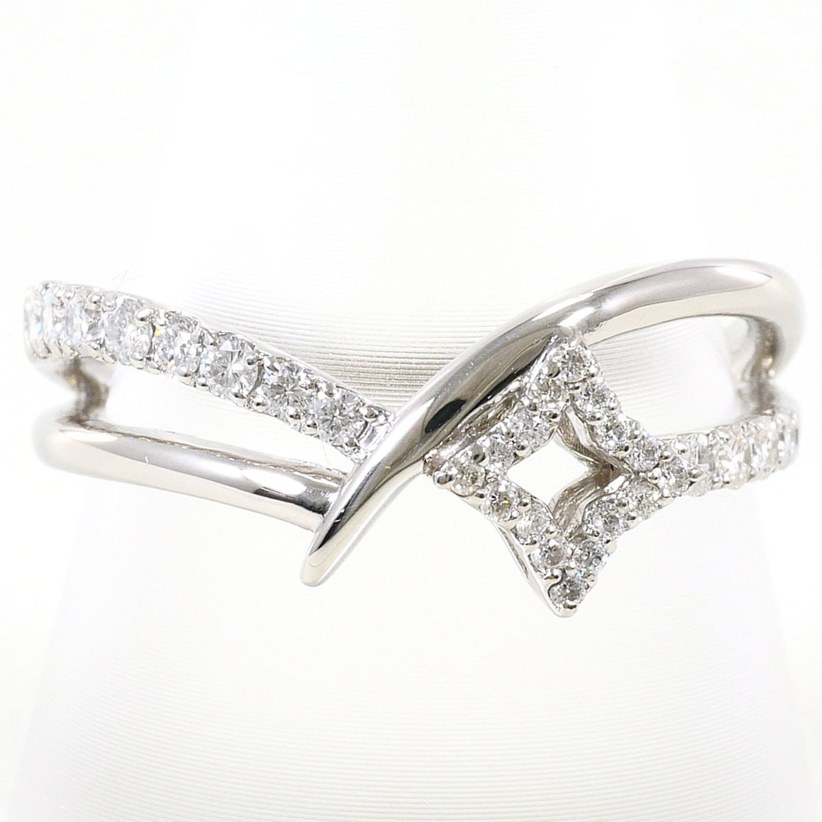 Band Ring Platinum 900: Band Ring Platinum 900 Platinum 900 band ring features a diamond stone set in a platinum metal construction. Weighing 5.6g, this 9mm wide ring is available in a US size 8. In like new condition, it