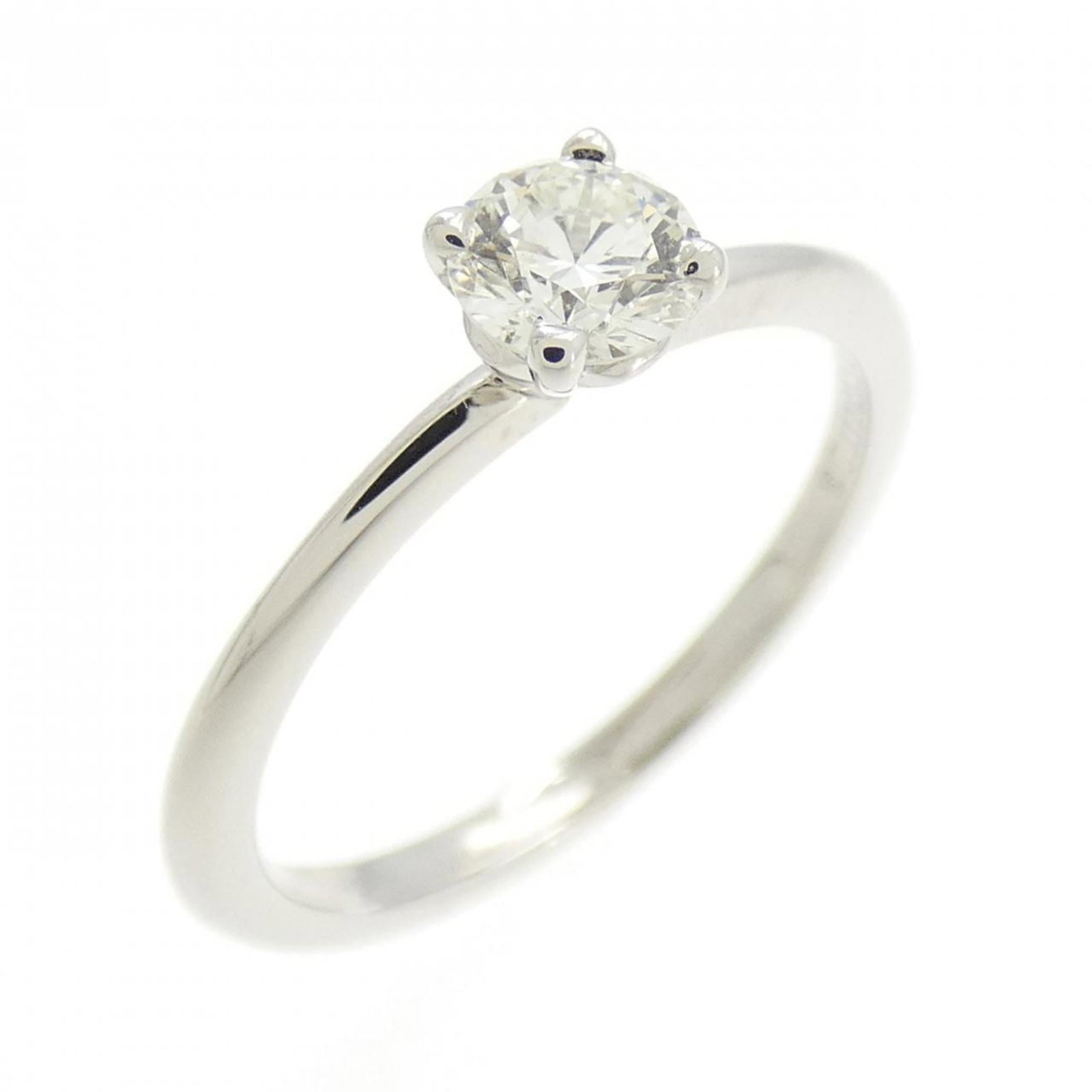 TIFFANY Band Ring Platinum: TIFFANY Band Ring Platinum Platinum band ring from Tiffany featuring a 0.25ct diamond, available in a US Size 3.5 and 4mm width. Gently used with minor signs of wear, this ring is in very good