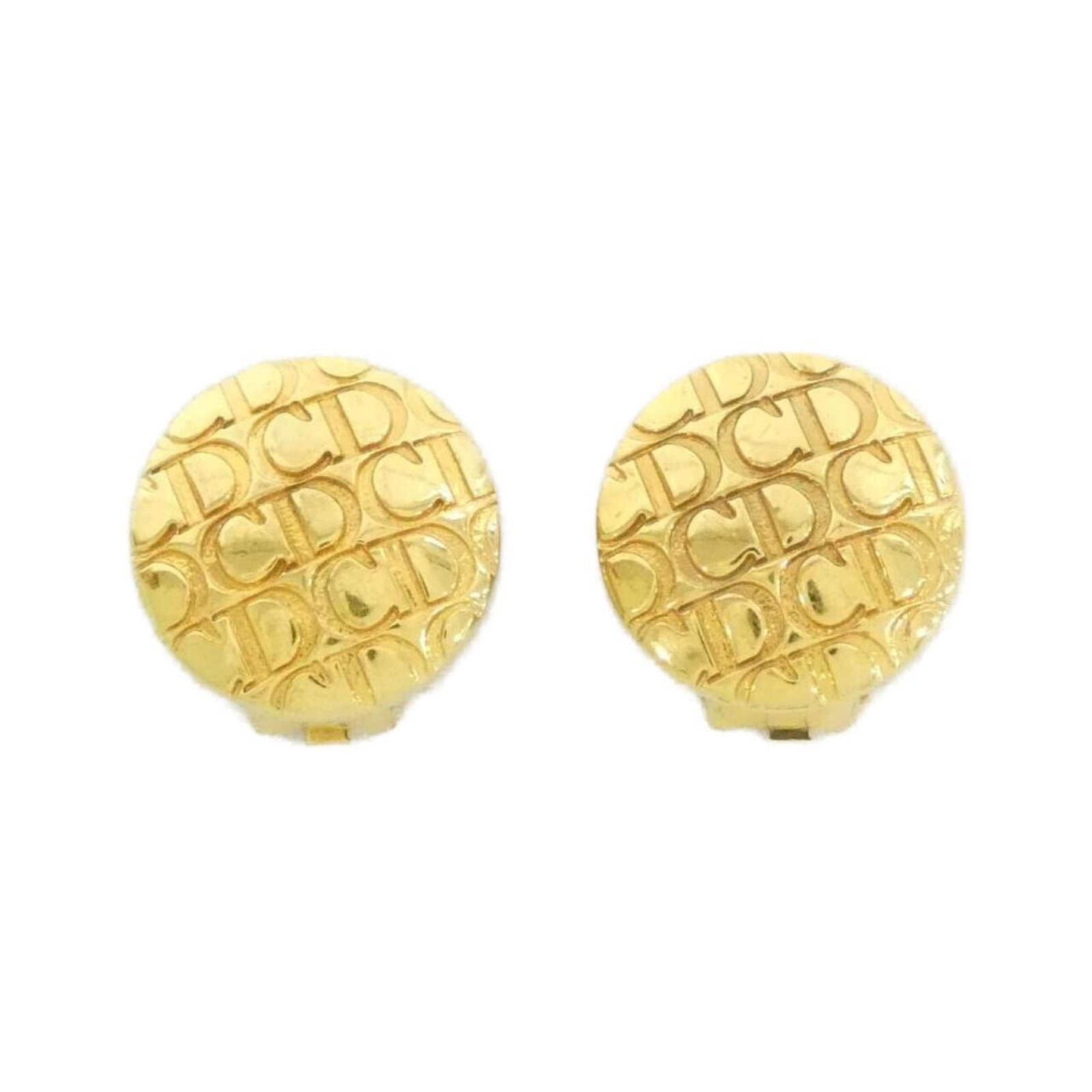 CHRISTIAN DIOR Clip Earrings Gold: CHRISTIAN DIOR Clip Earrings Gold Clip earrings in 18k gold, bearing the signature of Christian Dior, are available. Made from high-quality gold, these clip earrings feature a classic design that adds