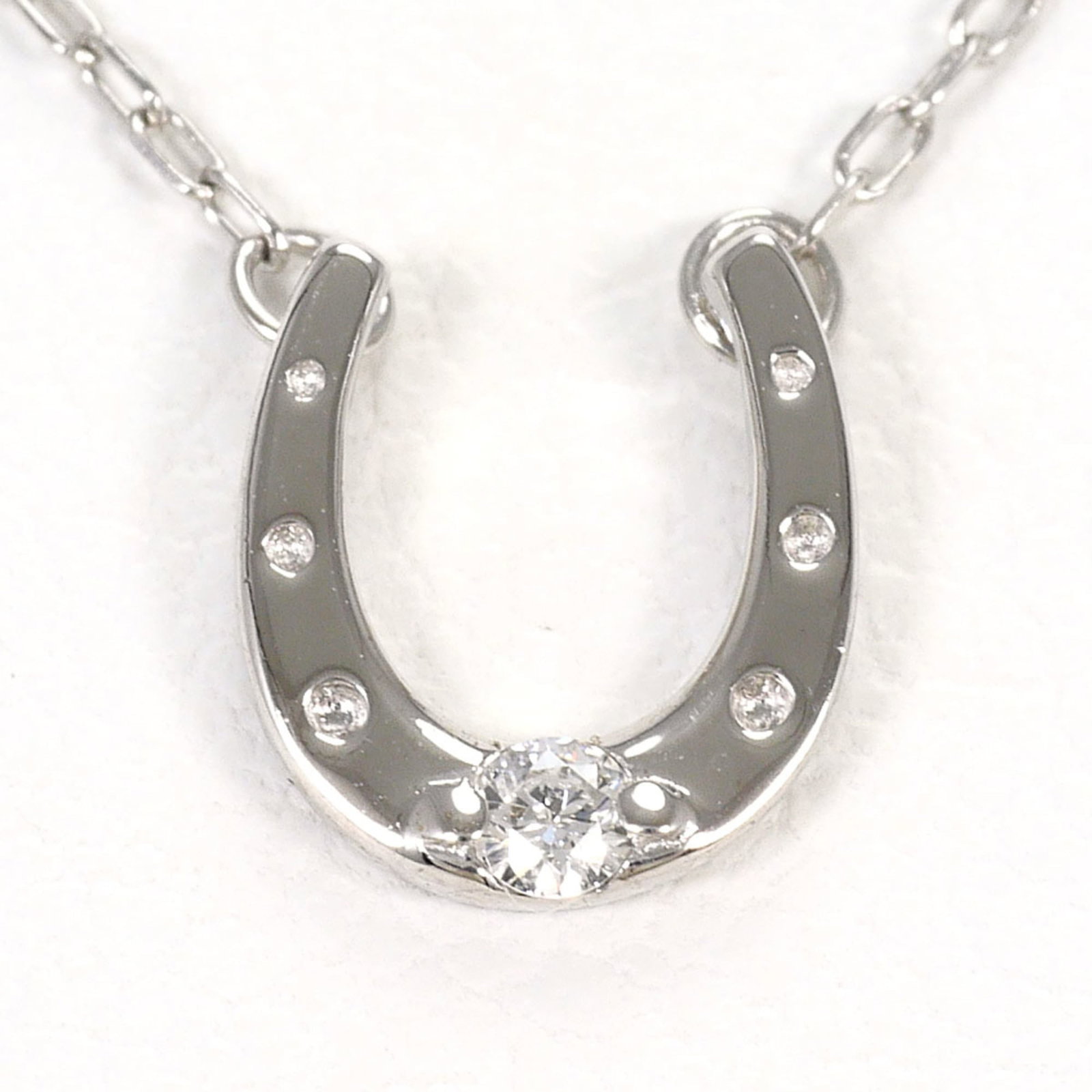 White Gold (10K): White Gold (10K) White gold (10K) necklace with a 0.02 carat diamond pendant, set in a 6mm x 5mm pendant and 40 cm chain, in excellent condition with no visible wear. The necklace is made from 10K