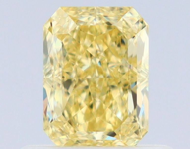 GIA Radiant 0.62ct Fancy Yellow VVS2 - Loose Natural Diamond: GIA Radiant 0.62ct Fancy Yellow VVS2 - Loose Natural Diamond GIA-certified, this 0.62ct Fancy Yellow VVS2 diamond boasts exceptional clarity and a vibrant, sunny hue. Its EX polish and VG symmetry
