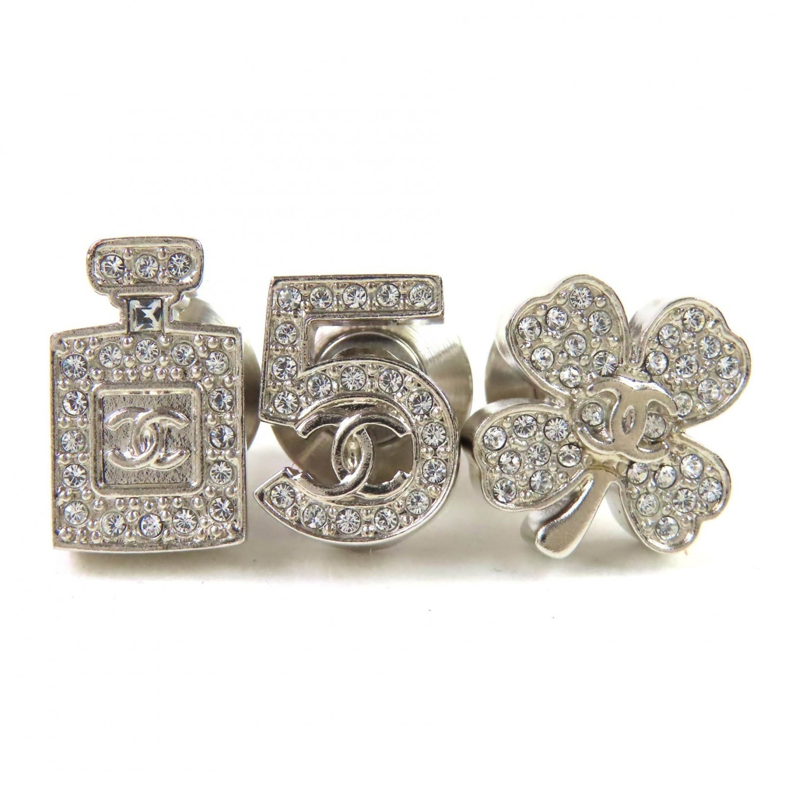 CHANEL Pin Brooch Silver: CHANEL Pin Brooch Silver Silver Chanel Pin Brooch with Rhinestone Stone, Pack of 3. This elegant pin brooch features a silver finish and a rhinestone stone, adding a touch of sophistication to any out