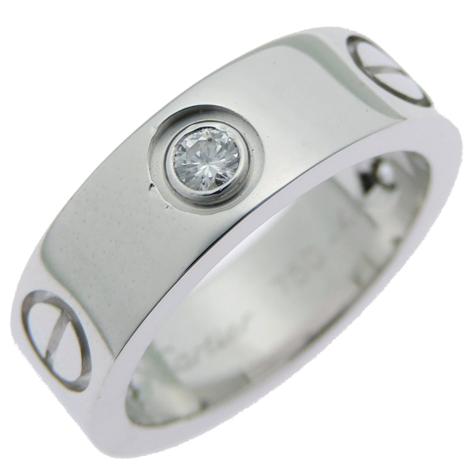CARTIER Band Ring White Gold (18K): CARTIER Band Ring White Gold (18K) Cartier Band Ring White Gold (18K) is a beautifully crafted band ring featuring 18K white gold and a diamond stone. Gently used with minor signs of wear, this item
