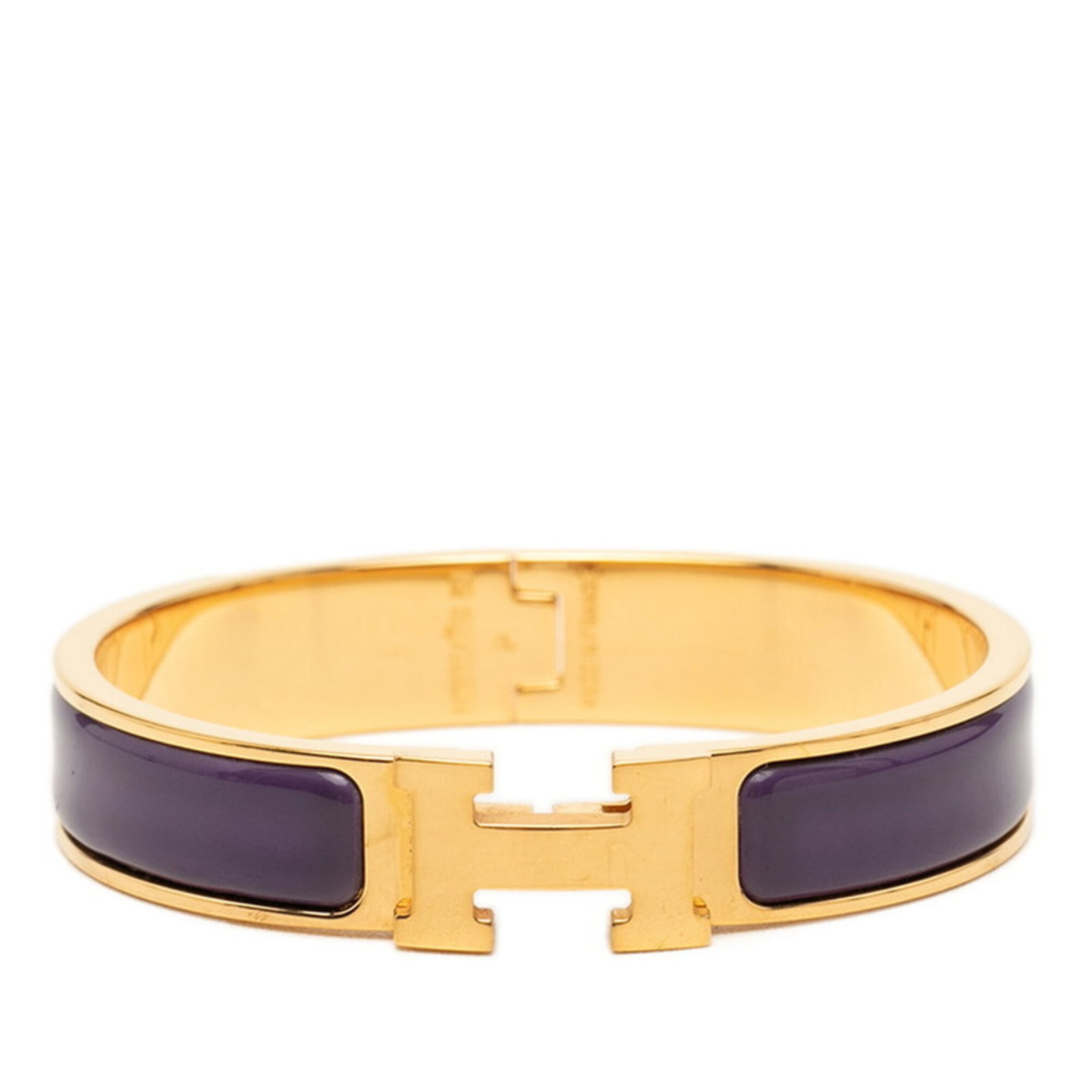 HERMES Charm Bracelet Enamel: HERMES Charm Bracelet Enamel Gold and purple enamel details adorn this 15.5cm charm bracelet from Hermes, a brand known for its high-quality craftsmanship. The item features visible wear, including