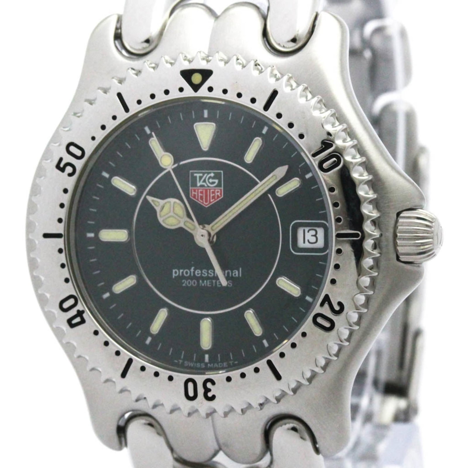 TAG HEUER Wristwatch Stainless Steel: TAG HEUER Wristwatch Stainless Steel Stainless steel case and band provide a sleek, modern look, while the green dial adds a touch of sophistication. This TAG HEUER Sel watch features a quartz