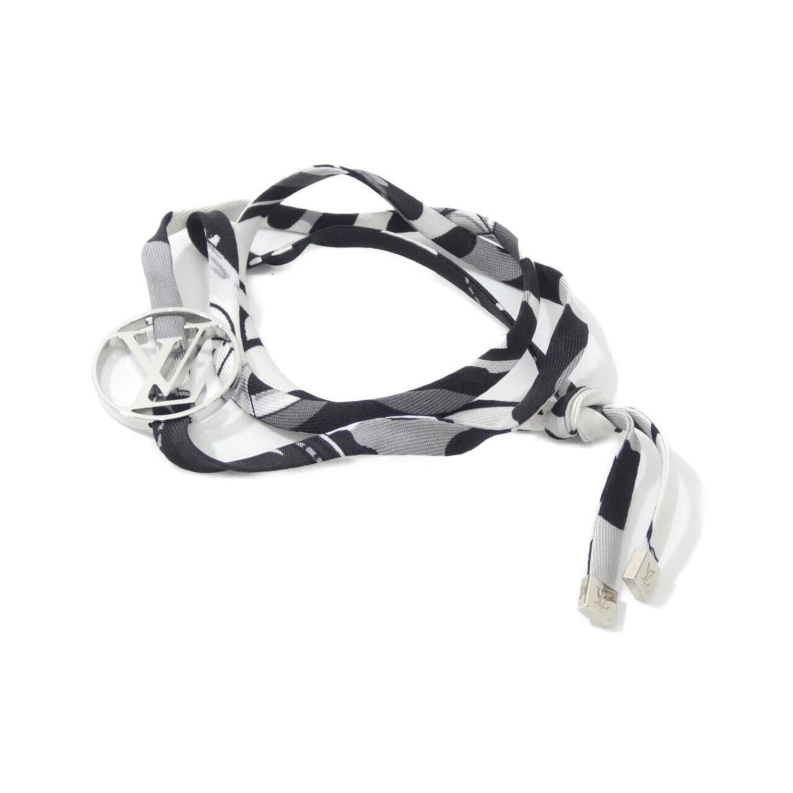 LOUIS VUITTON Charm Bracelet Silk: LOUIS VUITTON Charm Bracelet Silk The Louis Vuitton Charm Bracelet Silk is a sleek and sophisticated accessory, boasting a luxurious silk material and a timeless black color. Measuring 60cm in length,