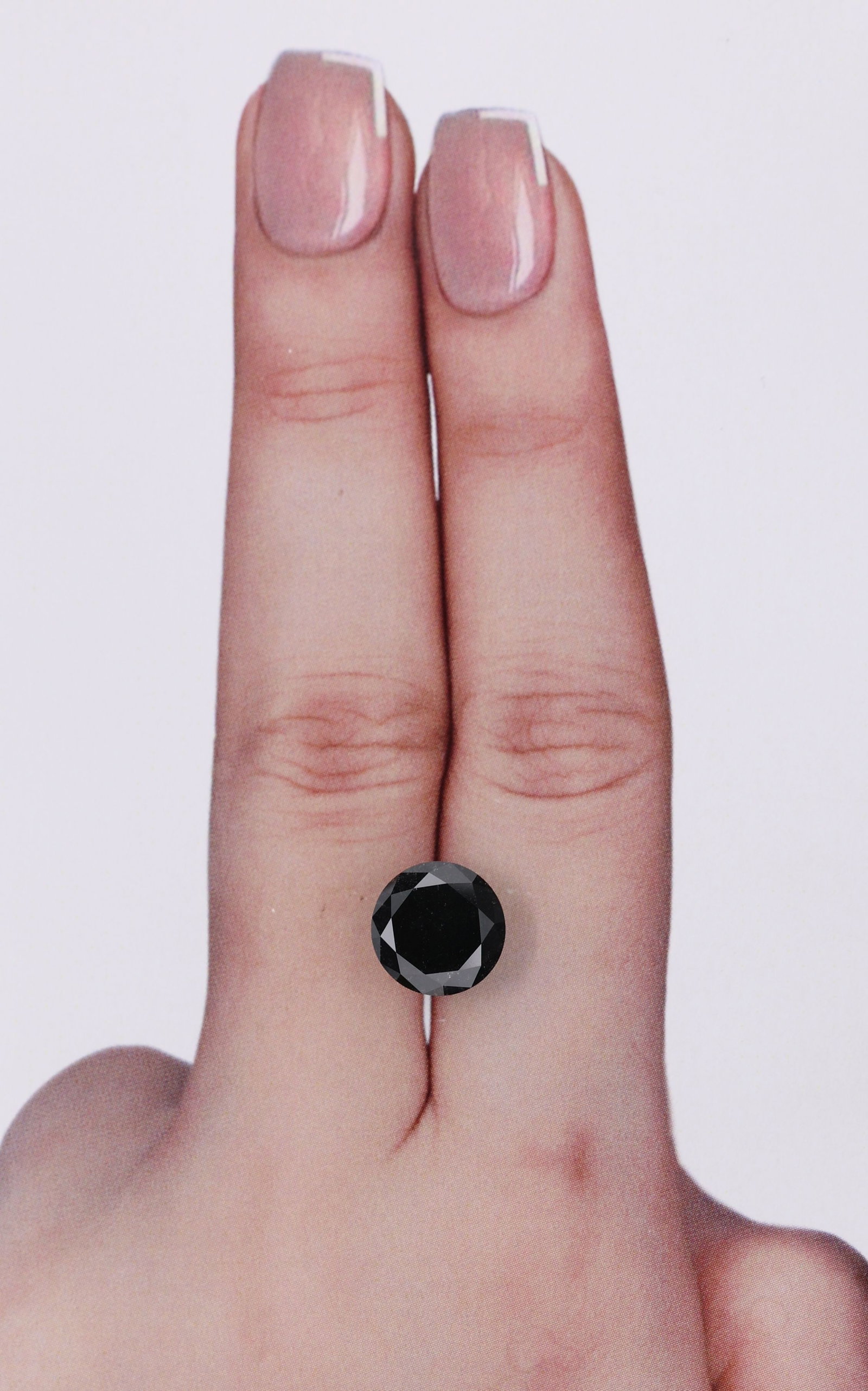 Round 2.64ct Fancy Black VVS2 - Loose Natural Diamond: Round 2.64ct Fancy Black VVS2 - Loose Natural Diamond 2.64ct Fancy Black VVS2 - Loose Natural Diamond. This exquisite diamond boasts a Fancy Black color, exceptional clarity (VVS2), and impressive EX