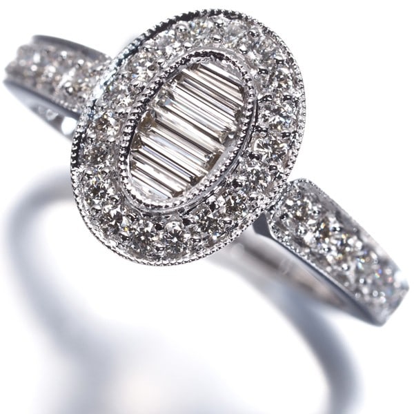 Diamond 0.544Ct Baguette-Cut Milgrain Ring 18K 750 White Gold: Diamond 0.544Ct Baguette-Cut Milgrain Ring 18K 750 White Gold 18k white gold provides a luxurious backdrop for a stunning 0.544ct baguette-cut diamond, expertly set within a milgrain design that adds