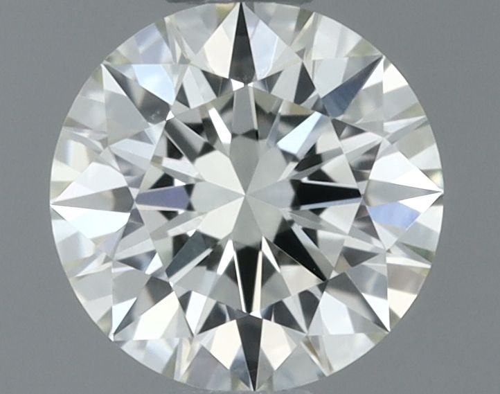 IGI Round 0.3ct J VVS2 - Loose Natural Diamond: IGI Round 0.3ct J VVS2 - Loose Natural Diamond IGI certified 0.3ct J VVS2 diamond, boasting EX cut, color, and polish characteristics, sits within a natural setting. Measuring 4.35L x 4.36W x 2.65H, t