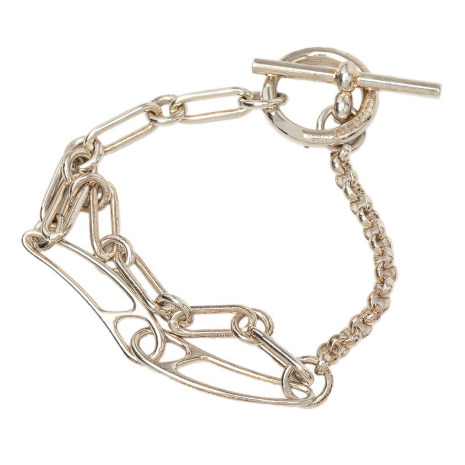 HERMES Charm Bracelet Silver 925: HERMES Charm Bracelet Silver 925 Silver 925 Charm Bracelet from Hermes Features a classic charm design, measuring 15cm in length, with visible signs of wear and minor scratches. The bracelet is made