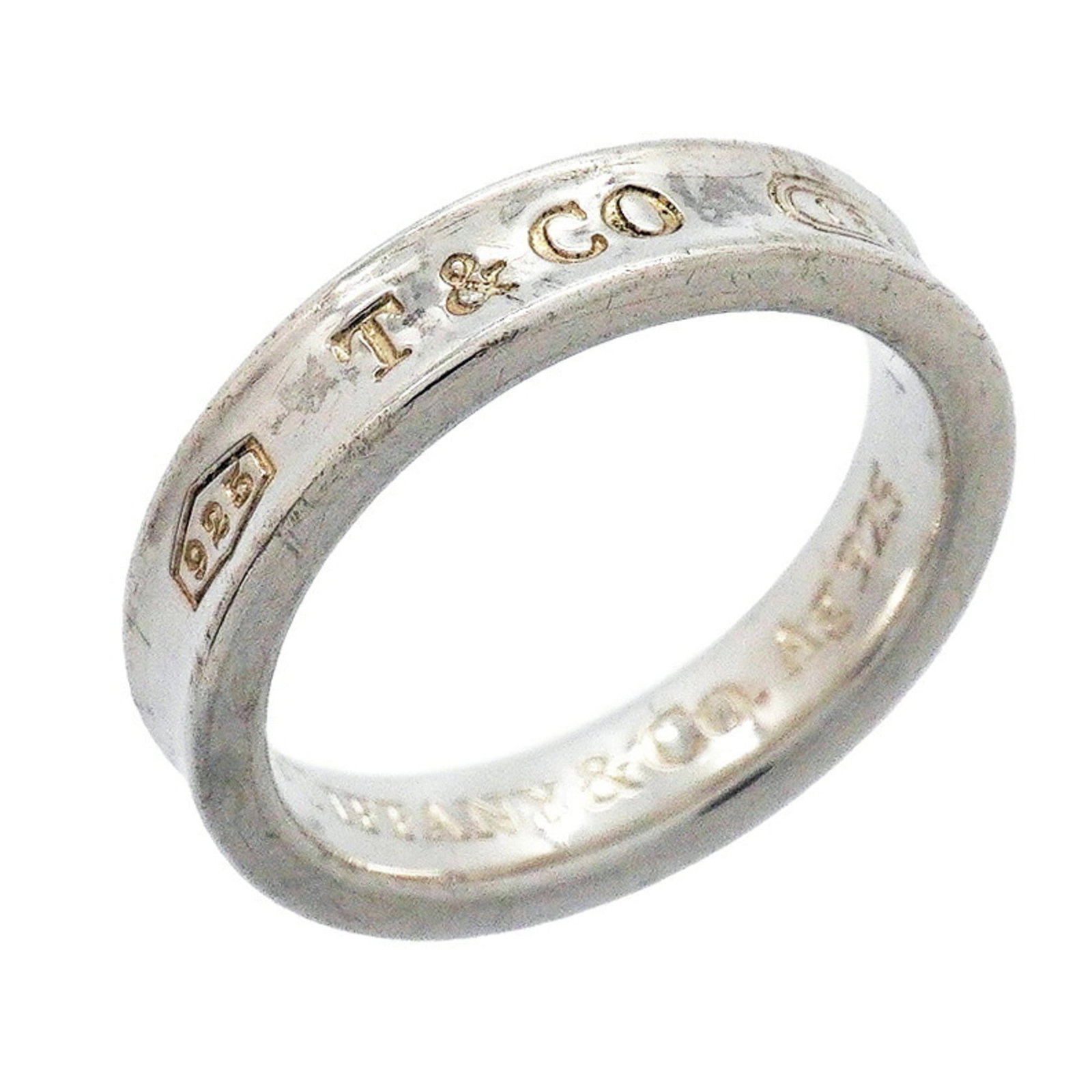 TIFFANY Band Ring Silver 925: TIFFANY Band Ring Silver 925 Silver 925 band ring from Tiffany, a classic design with visible wear and scratches, adding to its unique character. Made from durable silver, this ring is fully