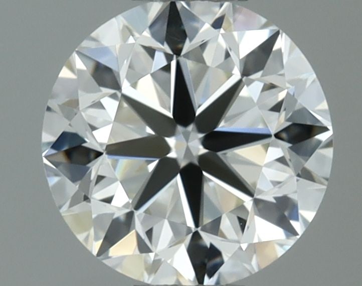 IGI Round 0.7ct H VVS1 - Loose Natural Diamond: IGI Round 0.7ct H VVS1 - Loose Natural Diamond 0.7ct IGI Round H VVS1 Diamond - Exceptional Clarity and Cut. This loose natural diamond boasts an EX polish and symmetry, while its H color and VVS1 cla