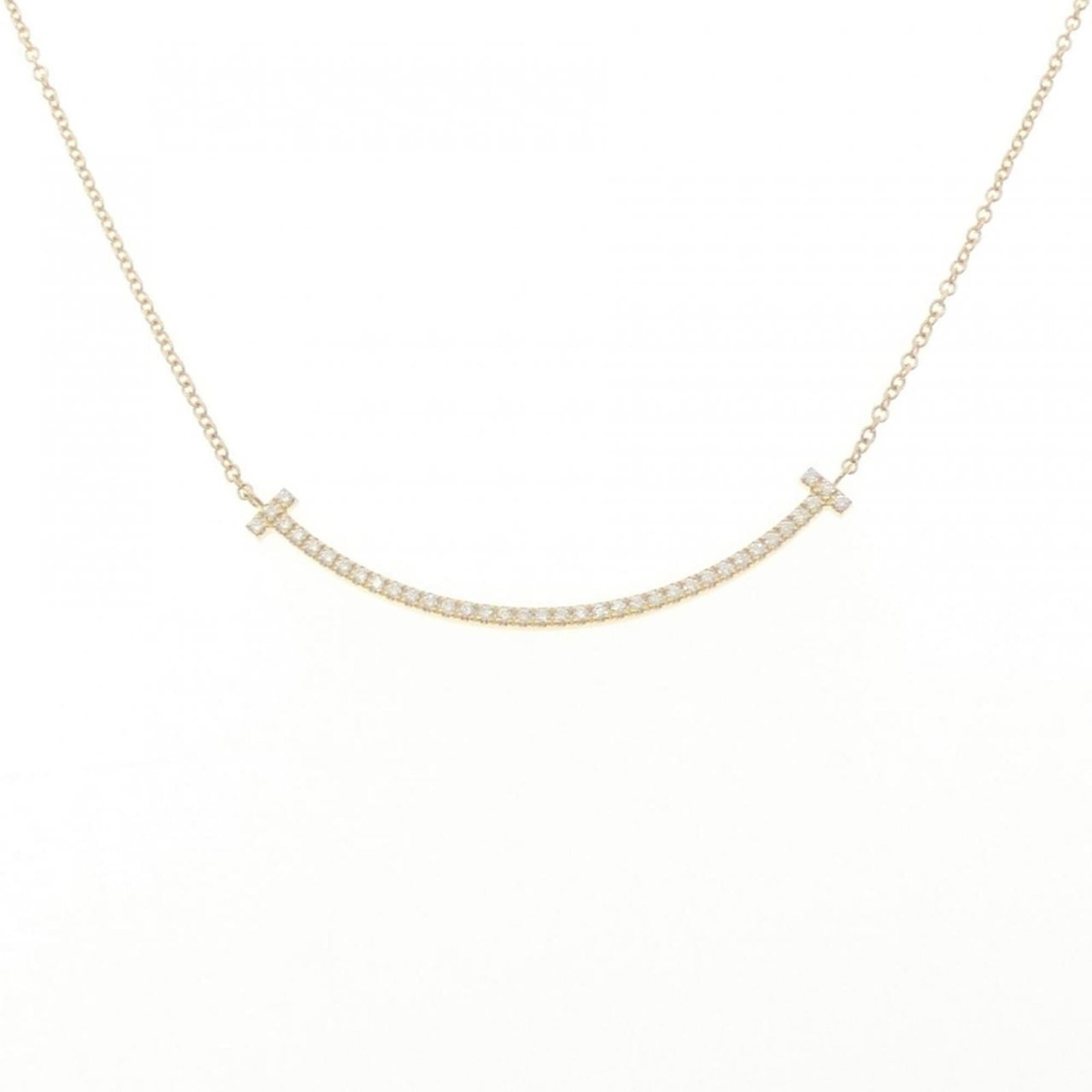 TIFFANY Yellow Gold (18K): TIFFANY Yellow Gold (18K) Yellow gold pendant necklace from Tiffany, featuring a 3.5mm x 36.9mm diamond pendant suspended from a 40 cm chain. This 18K yellow gold piece is in like new condition, with