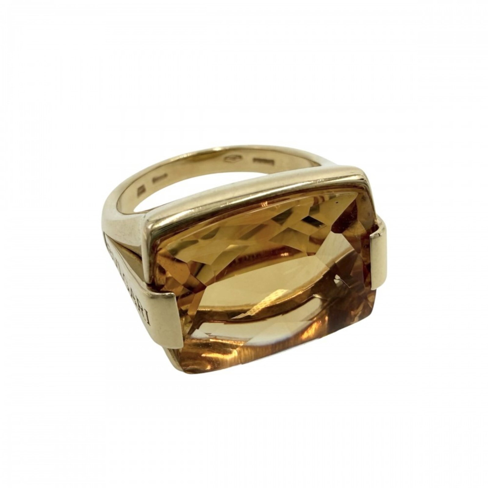 BVLGARI Band Ring Yellow Gold (18K): BVLGARI Band Ring Yellow Gold (18K) Yellow gold (18K) BVLGARI Band Ring with citrine stone, a classic women's accessory from a renowned luxury brand. This 18.00mm band ring features visible wear and s