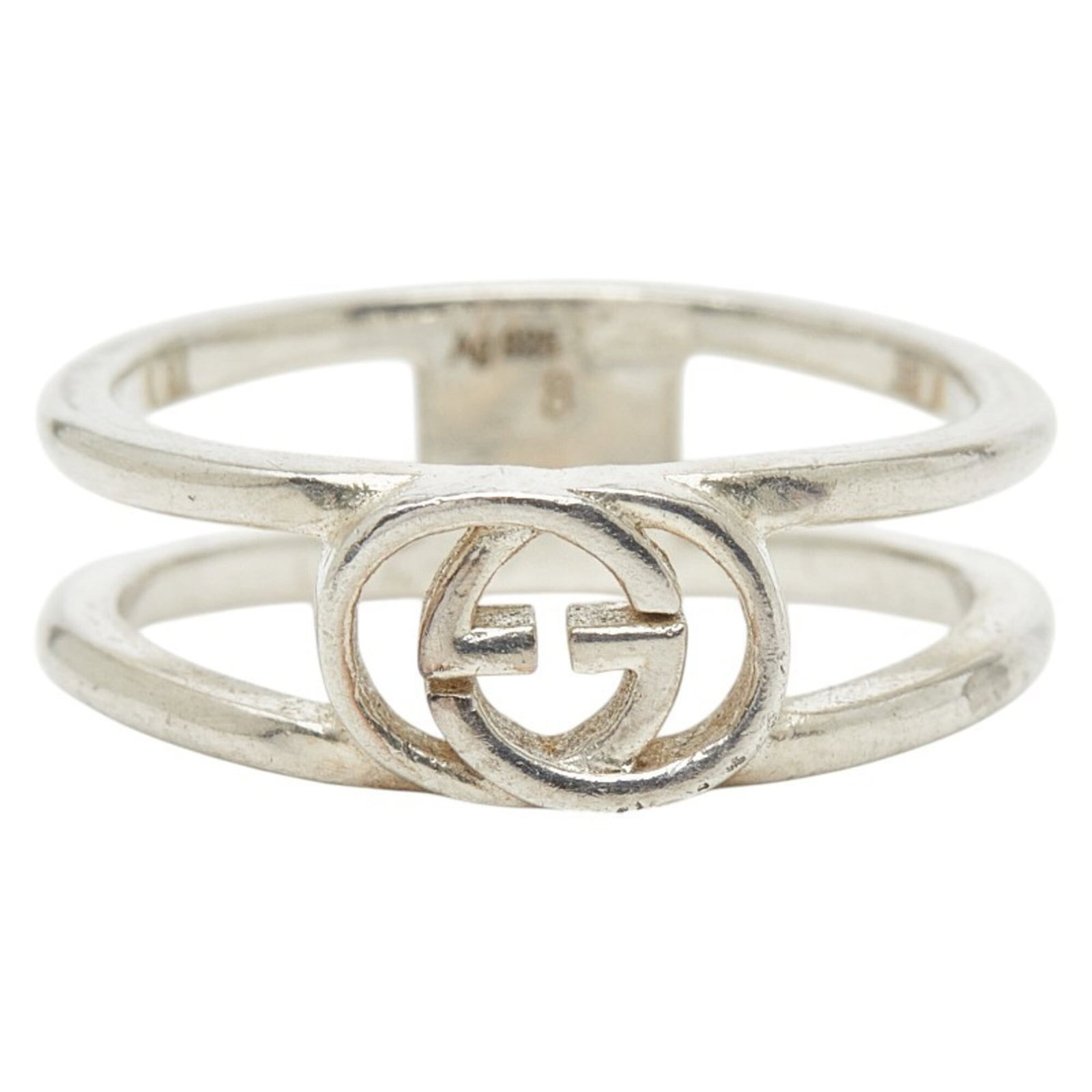 GUCCI Band Ring Silver 925: GUCCI Band Ring Silver 925 Silver 925 band ring from Gucci, featuring a sleek and modern design with a subtle width of 5.2mm. This pre-owned ring showcases visible wear, including scratches and scuffs