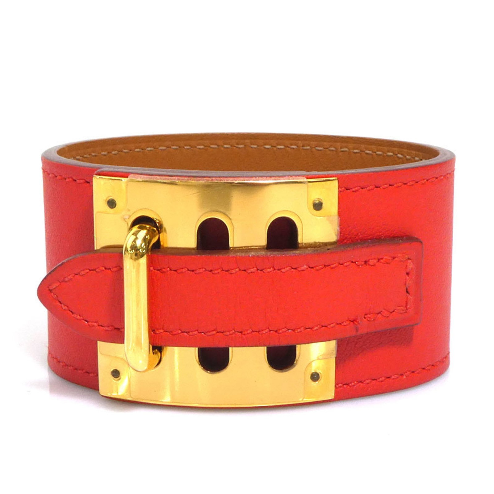 HERMES Charm Bracelet Leather Metal: HERMES Charm Bracelet Leather Metal Gold and red orange leather meet metal in this classic Hermes charm bracelet, available in a 15cm-17cm length. The item features visible wear, including scratches a