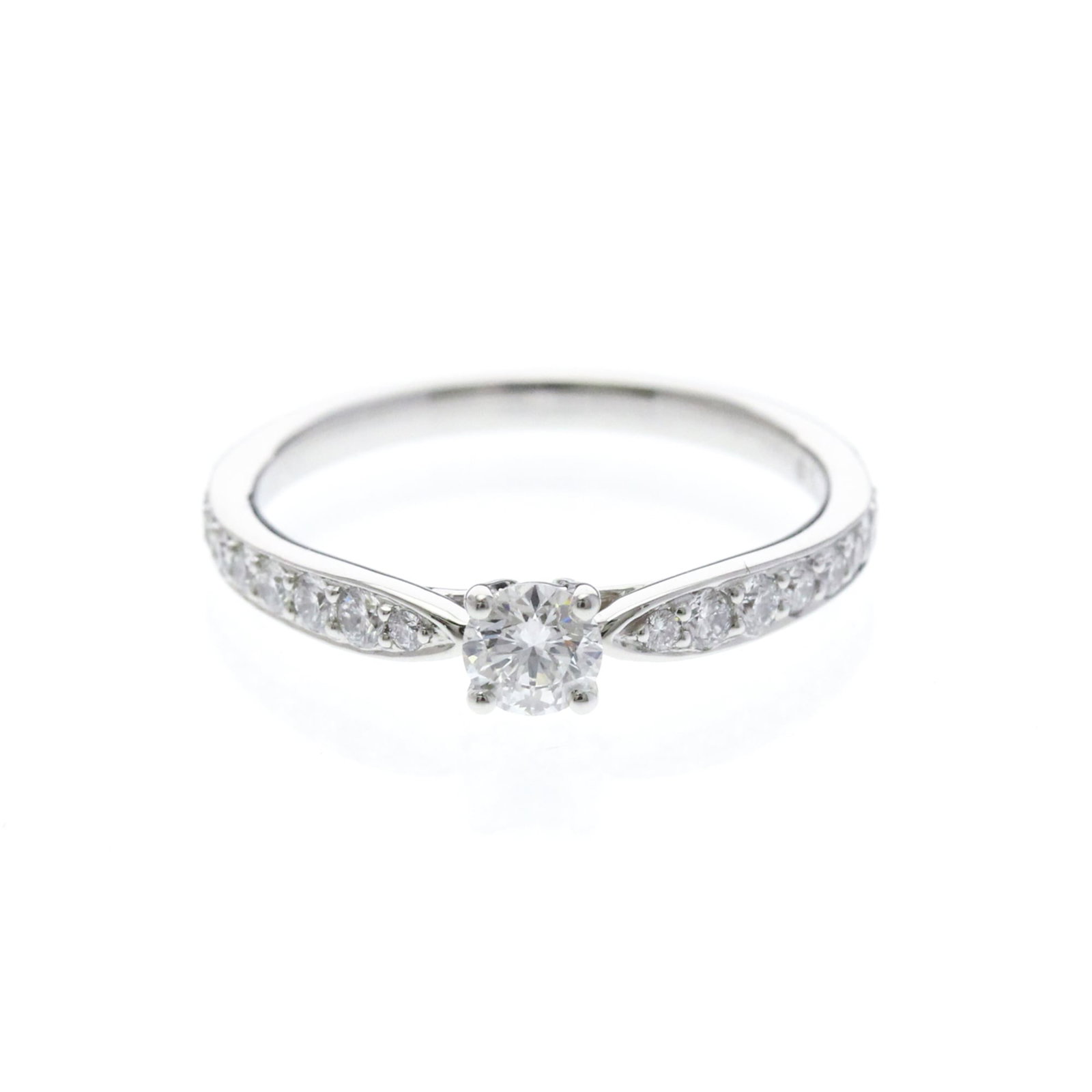 TIFFANY Band Ring Platinum: TIFFANY Band Ring Platinum Platinum band ring featuring a 0.20ct F VVS1 brilliant cut diamond, set in a stylish Tiffany Harmony design. The ring boasts a sleek silver-toned platinum metal