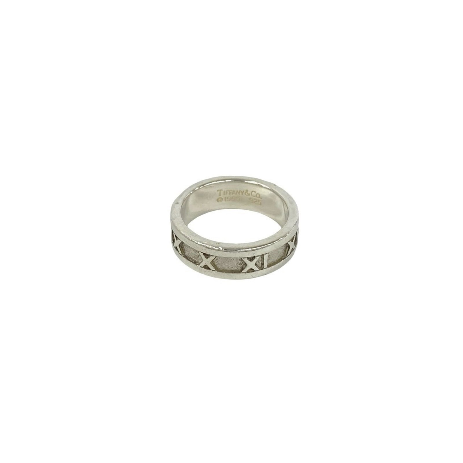 TIFFANY Band Ring Silver 925: TIFFANY Band Ring Silver 925 Silver 925 band ring from Tiffany features a sleek, modern design. The ring bears visible signs of wear, including scratches and scuffs, but remains fully functional.