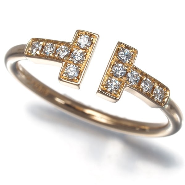 Tiffany&Co. Ring Diamond Tiffany T Wire Us6-6.25 18K 750 Rose Gold: Tiffany&Co. Ring Diamond Tiffany T Wire Us6-6.25 18K 750 Rose Gold Tiffany & Co.'s 18k rose gold Tiffany T wire ring boasts a natural diamond set into a stunning design. The ring's 5.9mm width and 2.7