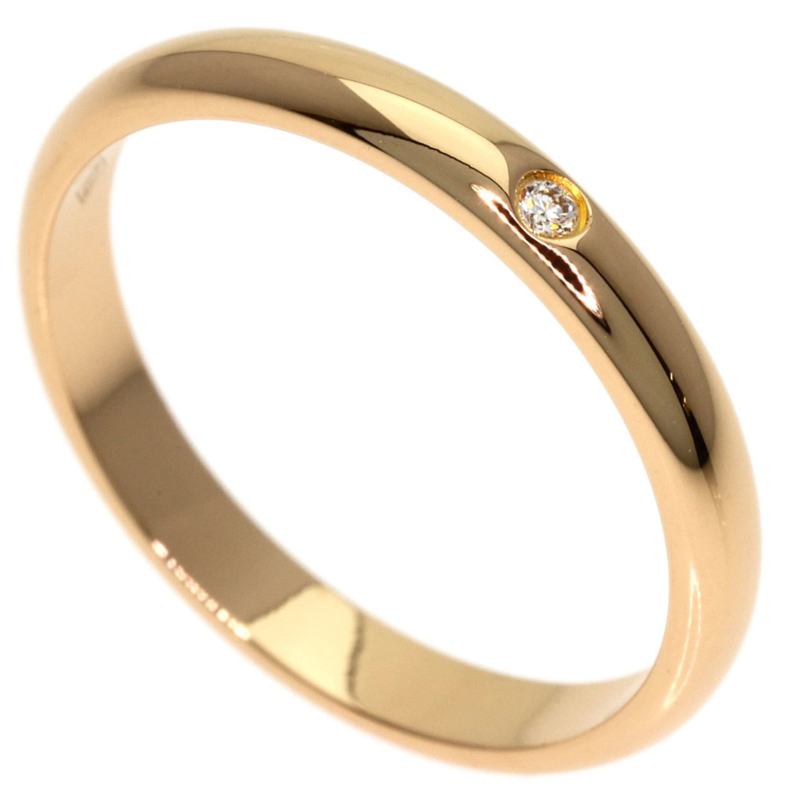 CARTIER Band Ring Pink Gold (18K): CARTIER Band Ring Pink Gold (18K) Pink gold (18K) band ring from Cartier, featuring a diamond stone and a classic design. The item is in very good condition, with minor signs of wear and small scratch