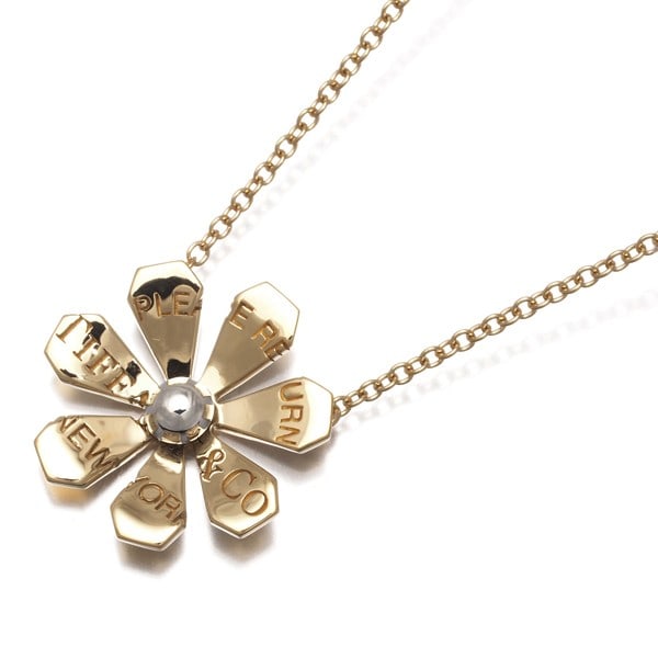Tiffany&Co. Necklace Return To Tiffany Love Bugs Flower 18K Yg/Silver 925: Tiffany&Co. Necklace Return To Tiffany Love Bugs Flower 18K Yg/Silver 925 18k yellow gold and sterling silver combine in this elegant Return to Tiffany Love Bugs Flower necklace, featuring a delicate 