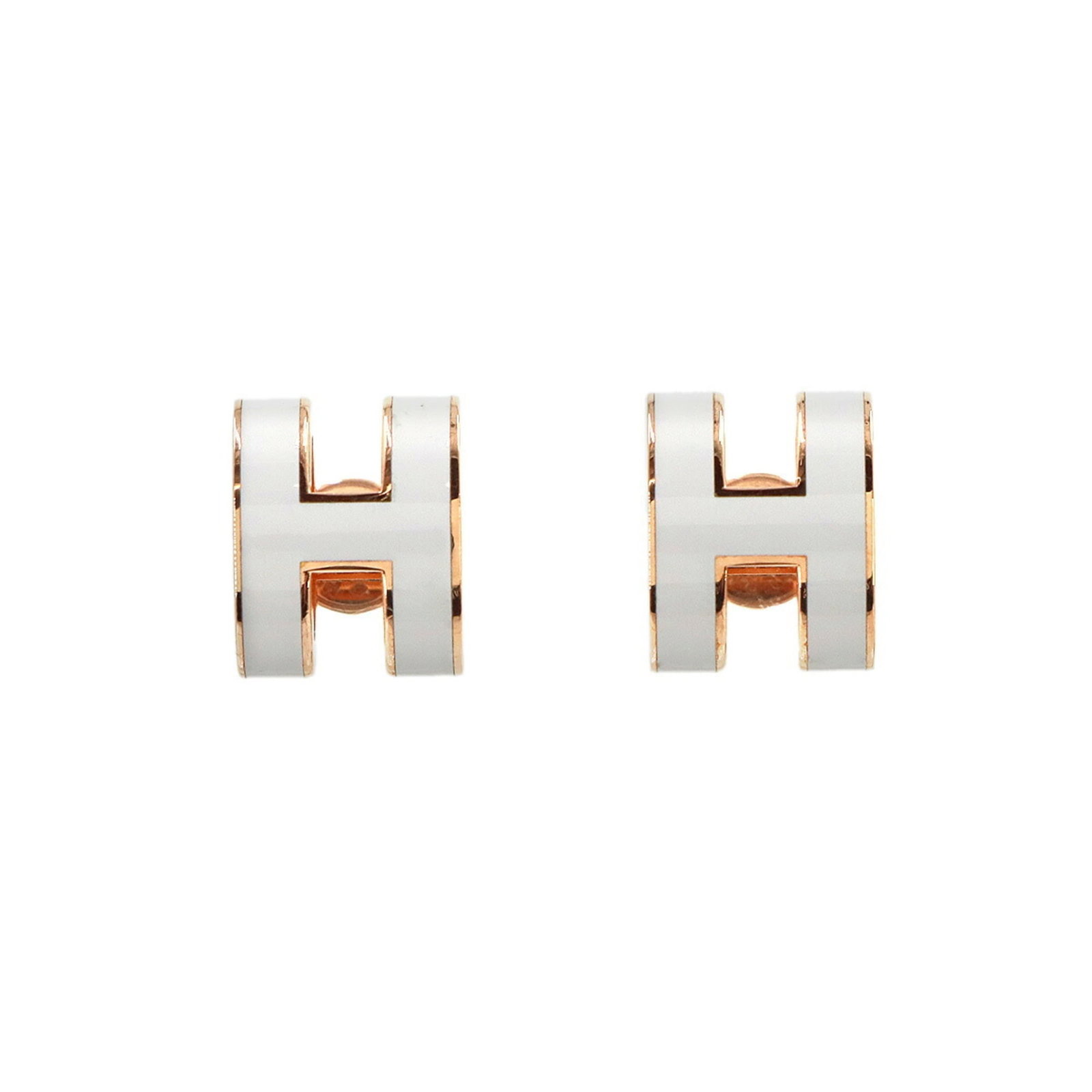 HERMES Stud Earrings Rose Gold White: HERMES Stud Earrings Rose Gold White Stud earrings from the renowned brand Hermes, featuring a striking rose gold and white design. These brand new earrings are in original, unused condition, with